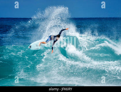 Surfer cutting wave. Oahu, Hawaii Stock Photo