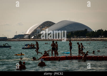 SOCHI, SC - 30.06.2017: GENERAL PHOTOS SOCHI 2017 - Moving in the city of Sochi, one of the four venues of the 2017 Confederations Cup and 2018 World Cup in Russia. In the photo, the Fisht Stadium (Olympic Stadium of Sochi) and bathers on the beach in front of the stadium. (Photo: Marcelo Machado de Melo/Fotoarena) Stock Photo