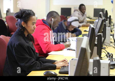 Valimbavaka Ranaivomanana (26, L) from Madagascar sits in front of a computer at the African Institute for Mathematical Sciences (AIMS) in Muizenberg, not farm from Cape Town, South Africa, 20 June 2017. An african mathematics institute is aiming to find the next Einstein. Young geniuses from all over Africa study here. Some dream of a Nobel Prize. Photo: Kristin Palitza/dpa Stock Photo