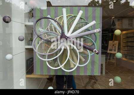 Wimbledon, London, UK. 1st July 2017. Retail shops, restaurants and bars decorate their windows with tennis themes for the two weeks of the tennis championships which start Monday 3rd July. Credit: Malcolm Park/Alamy Live News. Stock Photo