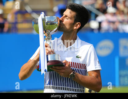 Eastbourne, UK 01st July, 2017 Novak Djokovic of Serbia celebrates with his trophy after beating Gael Monfils of France in the MenÕs final during the MenÕs final during day Seven of the Aegon International Eastbourne on July 01, 2017 in Eastbourne, England Credit: Paul Terry Photo/Alamy Live News Credit: Paul Terry Photo/Alamy Live News Stock Photo