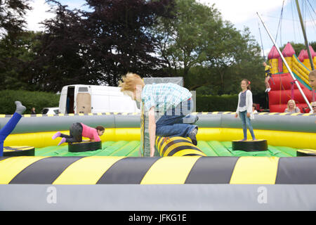 Biggin Hill, UK. 1st July, 2017. Biggin Hill's annual festival gets underway in Kent. The festival has lots of fun for all the family complete with a fun dog show, judo show, gymnastics, belly dancers, reptiles, funfair rides, stalls, classic cars, motorcycles, performing arts school and was opened by the Mayor of Bromley, Cllr Kathy Bance MBE. There were lovely blue skies this year after the washout last year due to heavy rain. Credit: Keith Larby/Alamy Live News Stock Photo