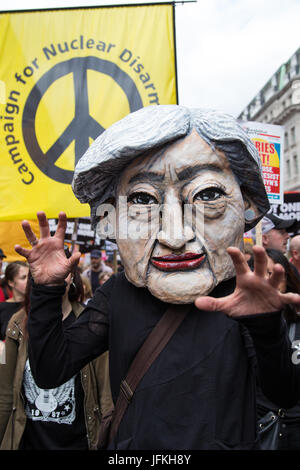 London, UK. 1st July, 2017. A protester wearing a Theresa May mask among thousands of people from many different campaign groups and trade unions marching on the Not One More Day national demonstration organised by the People's Assembly Against Austerity in protest against continuing austerity, cuts and privatisation and to call for a properly funded health service, education system and housing. A minute's silence was also held for the victims of the fire at Grenfell Tower. Credit: Mark Kerrison/Alamy Live News Stock Photo