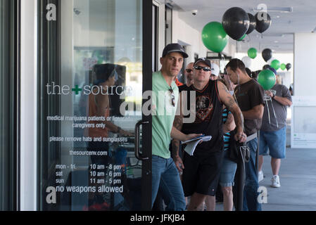 Las Vegas, USA. 01st July, 2017. customers wait outside of The Source marijuana dispensary during the first day of the state's recreational marijuana sales. State residents and visitors over the age of 21 are able to purchase up to one ounce of marijuana flower and 1/8 ounce of concentrate. Credit: Jason Ogulnik/Alamy Live News Stock Photo