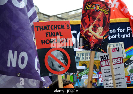 London, UK, 01 July 2017, Not one more day protest. Anti-austerity march through central London passes Trafalgar Square. Credit: JOHNNY ARMSTEAD/Alamy Live News Stock Photo
