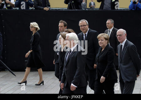 Speyer, Germany. 1st July 2017. Frank-Walter Steinmeier (2nd left), the President of Germany, his wife Elke Budenbender (left), Andreas Vosskuhle (centre), the President of the Federal Constitutional Court of Germany, Angela Merkel (2nd right), the Chancellor of Germany, and Norbert Lammert (right), the President of the German Bundestag, walk to the Speyer Cathedral.  A funeral mass for the former German Chancellor Helmut Kohl was held in the Cathedral of Speyer. it was attended by over 100 invited guests and several thousand people followed the mass outside the Cathedral. Stock Photo