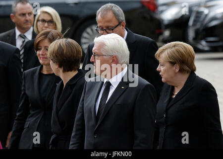 Frank-Walter Steinmeier (centre), the President of Germany, his wife Elke Budenbender (left), Andreas Vosskuhle (centre 2nd row), the President of the Federal Constitutional Court of Germany,, and Angela Merkel (right), the Chancellor of Germany, walk to the Speyer Cathedral, A funeral mass for the former German Chancellor Helmut Kohl was held in the Cathedral of Speyer. it was attended by over 1000 invited guests and several thousand people followed the mass outside the Cathedral. Photo: Cronos/Michael Debets Stock Photo