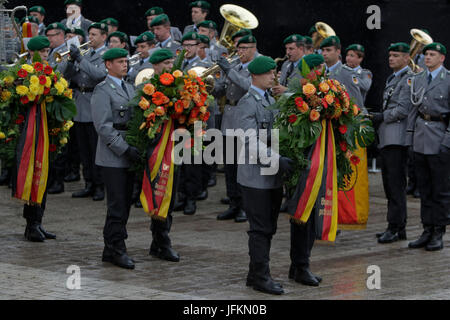 Soldiers carry wreaths past the coffin of Helmut Kohl. A funeral mass for the former German Chancellor Helmut Kohl was held in the Cathedral of Speyer. it was attended by over 1000 invited guests and several thousand people followed the mass outside the Cathedral. Photo: Cronos/Michael Debets Stock Photo