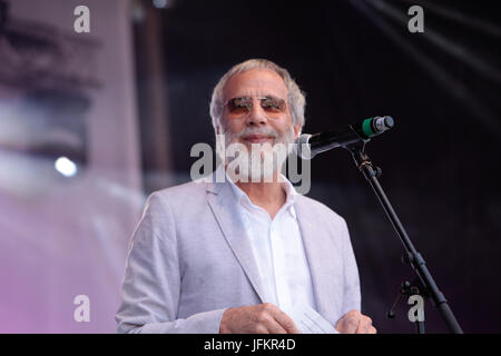 London, UK. 2 July, 2017. The mayor  of London Sadiq Khan together with Yusuf Islam ,better know as Cat Stevens and Masterchef champion Saliha Mahmoud-Ahmed on the stage in Trafalgar square welcoming the thousands who come and enjoy the Eid Celebrations  Credit: Paul Quezada-Neiman/Alamy Live News Stock Photo