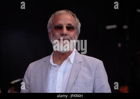 London, UK. 2 July, 2017. The mayor  of London Sadiq Khan together with Yusuf Islam ,better know as Cat Stevens and Masterchef champion Saliha Mahmoud-Ahmed on the stage in Trafalgar square welcoming the thousands who come and enjoy the Eid Celebrations  Credit: Paul Quezada-Neiman/Alamy Live News Stock Photo