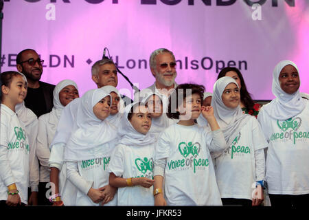 London, UK. 2 July, 2017. The mayor  of London Sadiq Khan together with Yusuf Islam ,better know as Cat Stevens and Masterchef champion Saliha Mahmoud-Ahmed on the stage in Trafalgar square welcoming the thousands who come and enjoy the Eid Celebrations  Credit: Paul Quezada-Neiman/Alamy Live News Stock Photo