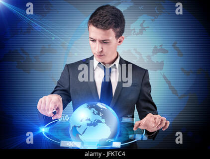 Businessman pressing buttons in computing concept Stock Photo