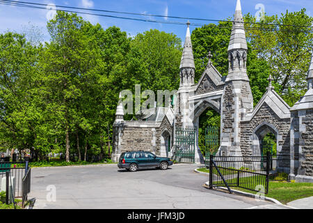 Montreal, Canada - May 28, 2017: Gate of cemetery on Mont Royal during bright sunny day in Quebec region city Stock Photo