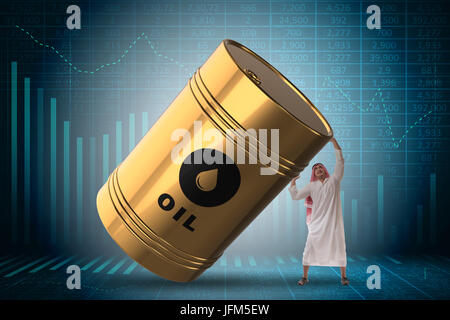 Arab businessman holding oil barrel Stock Photo