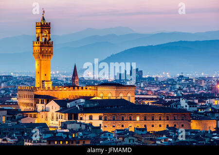Florence, Tuscany, Italy, cityscape and Palazzo Vecchio, Sunset, lights on, Stock Photo