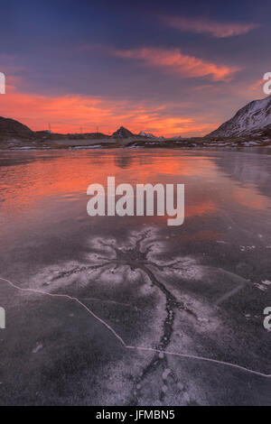 Lej Nair, Bernina Pass, Switzerland, Sunset on a frozen lake,