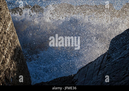 Natural Science, Sea waves crashing against the concrete pier Stock Photo