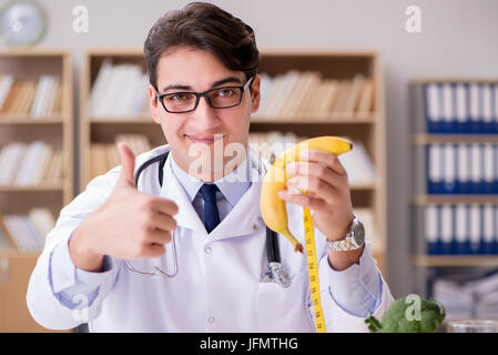 Doctor in dieting concept with fruits and vegetables Stock Photo