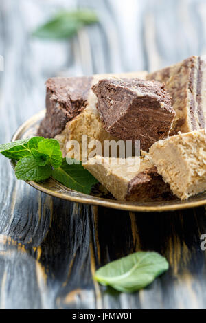 Halva from sesame seeds with chocolate closeup. Stock Photo