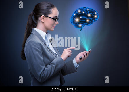 The businesswoman in artificial intelligence concept Stock Photo