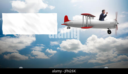 The biplane with businessman and blank banner Stock Photo