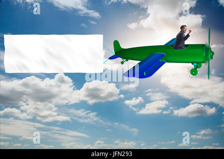 The old vintage airplane with banner ribbon Stock Photo