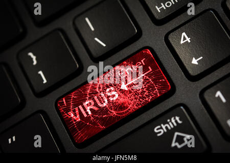 Message on broken red enter key of keyboard. Computer virus attack. Copy space Stock Photo