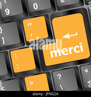 thank you (merci) word on computer keyboard key Stock Photo