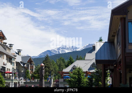 View of the snow on the mountains from the upper Whistler village Stock Photo