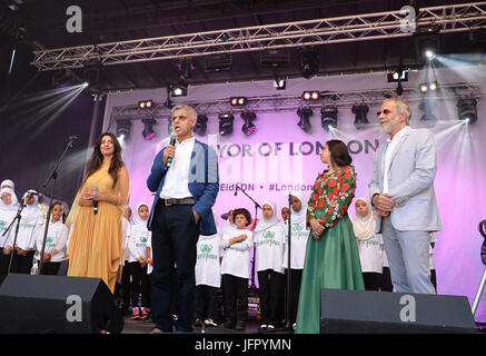 Mayor of London Sadiq Khan (second left) and Yusuf Islam (former stage name Cat Stevens) onstage during the Eid Festival in Trafalgar Square, London. Stock Photo