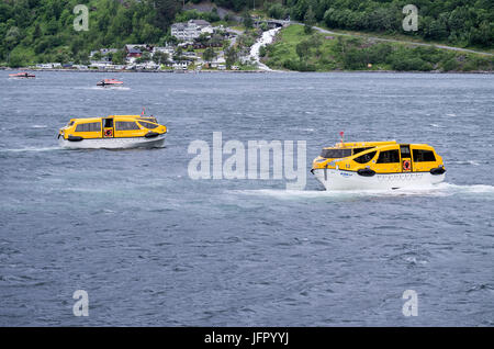 tender boats of cruise ships AIDAsol and ROTTERDAM in the Geirangerfjord, Norway Stock Photo