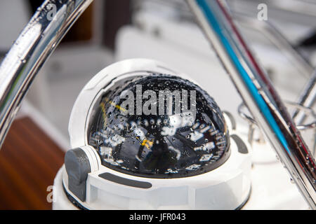 Close up of nautical compass on yacht Stock Photo