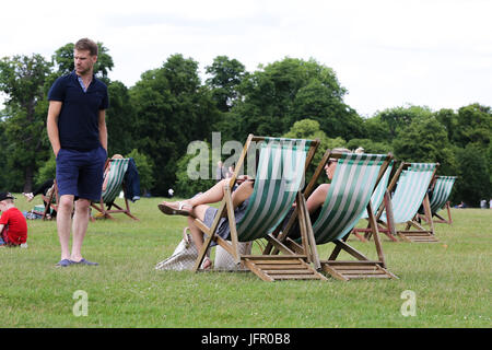 People enjoy a warm and sunny day in Hyde Park, London. Met office have reportedly issued a warning of a risk of torrential downpours on Friday (2nd June) in the afternoon and evening in the capital.  Featuring: View Where: London, United Kingdom When: 01 Jun 2017 Credit: Dinendra Haria/WENN.com Stock Photo