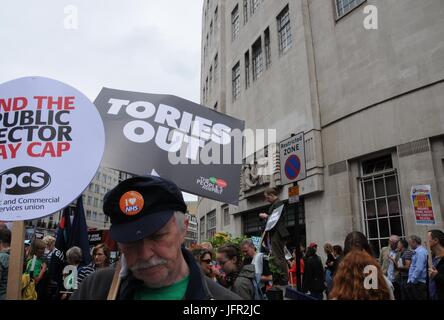 Supporters of the NHS join John McDonnell's Anti-Tory March in London. Stock Photo