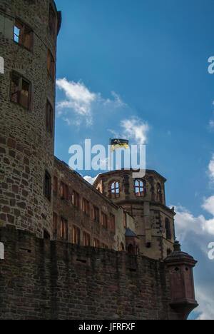 A tower of Heidelberg castle with a flag over the hill, Baden-Württemberg, Germany. Stock Photo