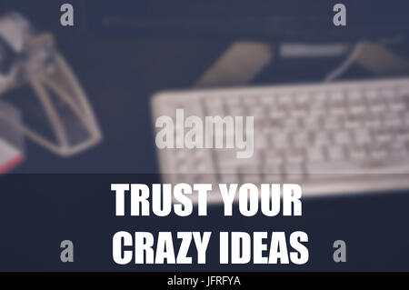 trust your crazy ideas with office blurring background Stock Photo