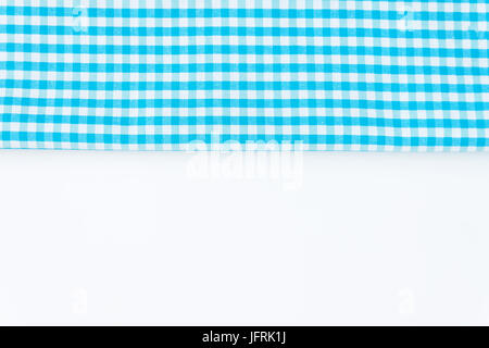 Turquoise, blue cloth, kitchen towel with checkered pattern, isolated on white background isolated. Stock Photo