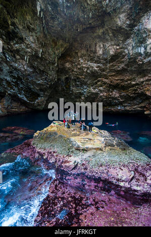 Divers preparing for their  dive in the grotto collapsed cave in Saipan, Northern Marianas, Central Pacific Stock Photo