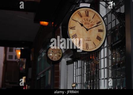 Old Clocks on Gandy Street in Exeter City Centre. Devon, UK. July, 2017. Stock Photo