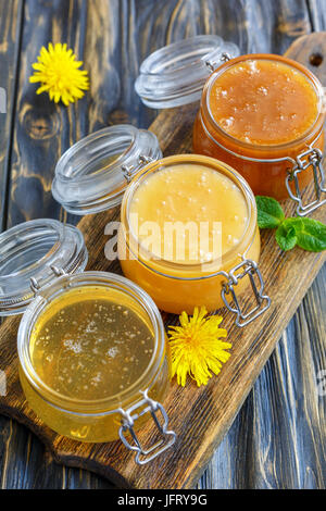 Linden,flower and buckwheat honey in jars. Stock Photo