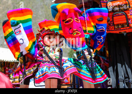 Colourful goods for sale in souvenir shop in Ollantaytambo, Peru. Ollantaytambo is a town and an Inca archaeological site in Peru. Stock Photo