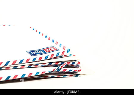 Airmail envelopes on white background. Stock Photo