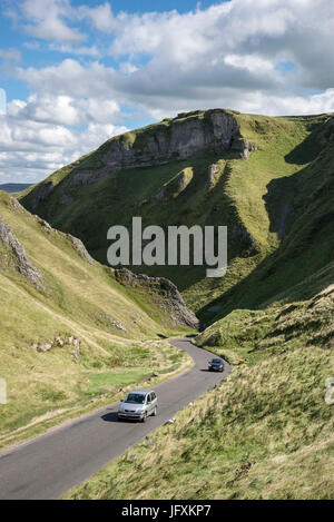 Cars on the road at Winnats Pass, Castleton, Derbyshire, England. Stock Photo