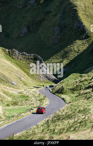 Cars on the road at Winnats Pass, Castleton, Derbyshire, England. Stock Photo