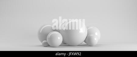 3d rendering of several sized reflected spheres inside a white studio Stock Photo