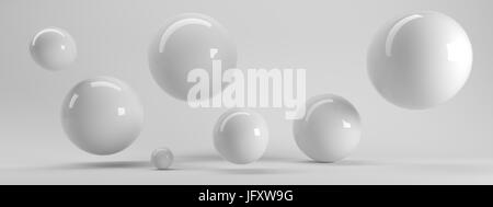 3d rendering of several sized reflected spheres inside a white studio Stock Photo