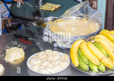 Ingredients for banana fritters (pancakes) in a roti shop, Thalang Road, Phuket, Thailand Stock Photo