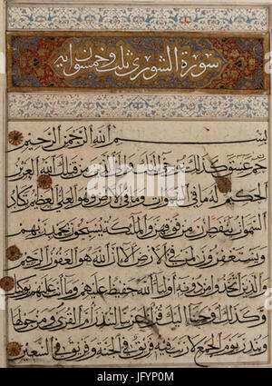 Islamic Qur'an manuscript folio on paper, featuring Arabic calligraphy ...