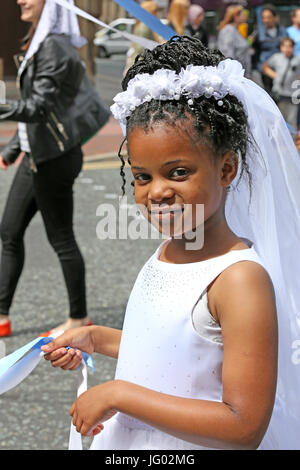 Manchester, UK. 2nd July, 2017. . A young girl in white for the  Madonna del Rosario procession in  Manchester,2nd July, 2017  Credit: Barbara Cook/Alamy Live News Stock Photo