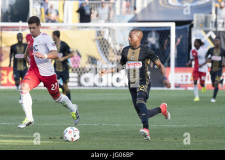 Chester, Pennsylvania, USA. 2nd July, 2017. Philadelphia Union's FAFA PICAULT, (22), fights for the ball against the Revolution's JOSH SMITH, (27) The Union beat the Revolution 3-0 Credit: Ricky Fitchett/ZUMA Wire/Alamy Live News Stock Photo